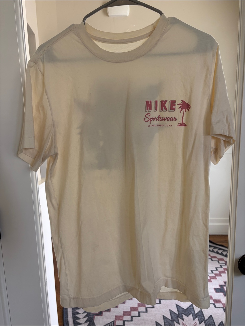 Nike Short-Sleeve Cream Tee with Pink Logo